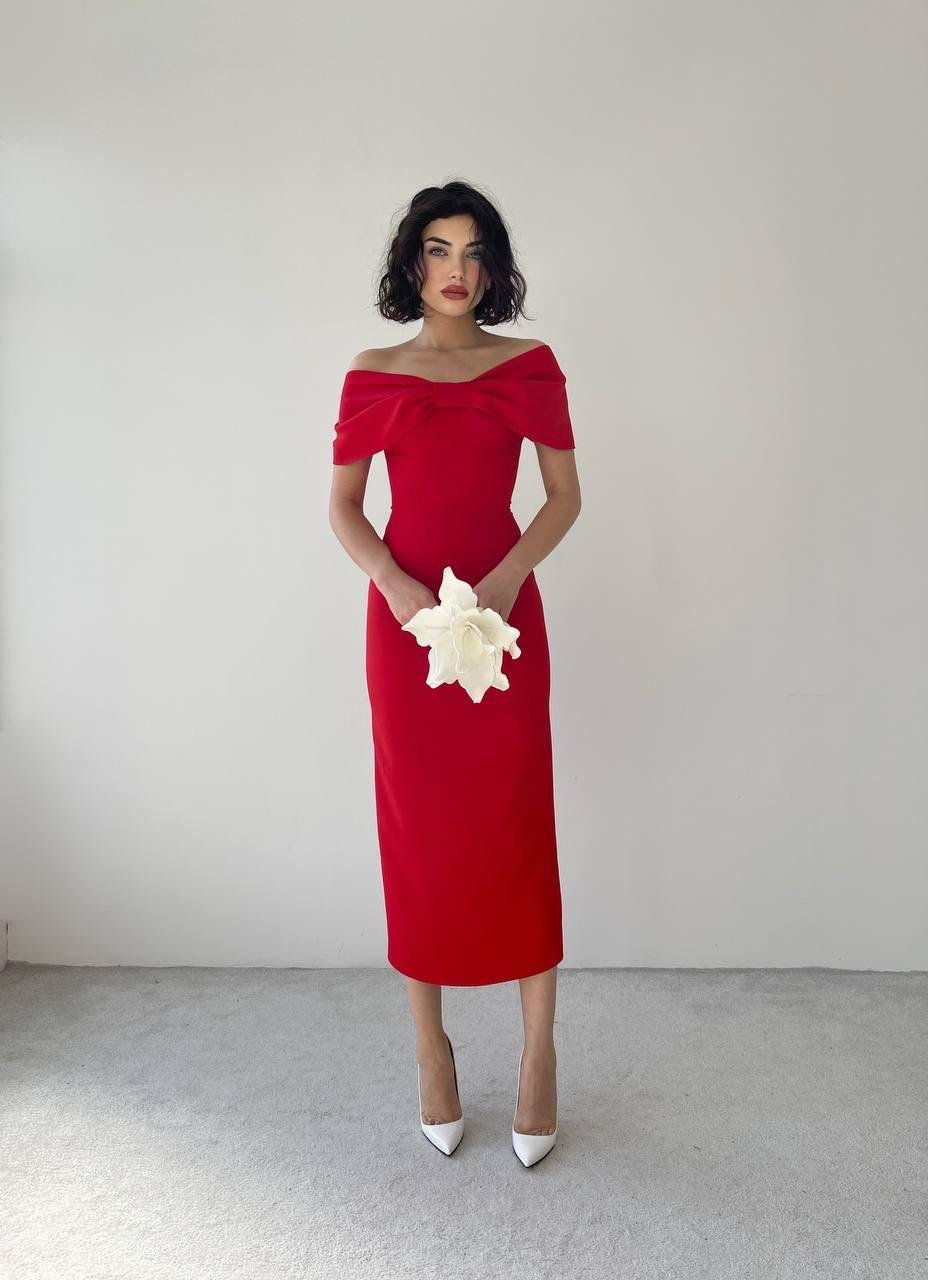 In era X red bow dress